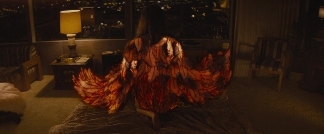 Frame from The Diary of a Teenage Girl — sitting, room, table