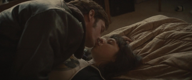 Wide shot frame from The Diary of a Teenage Girl — bed, kiss, person