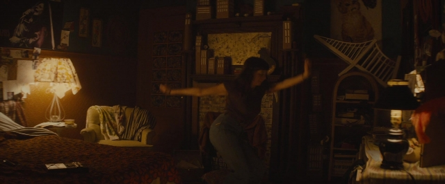 Wide shot frame from The Diary of a Teenage Girl — standing, room, bed