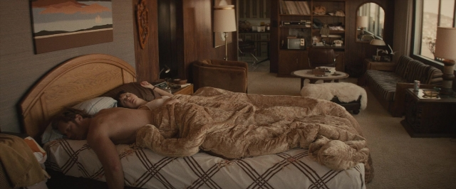 Frame from The Diary of a Teenage Girl — room, table, bed