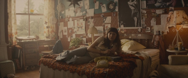 Medium shot frame from The Diary of a Teenage Girl — sitting, room, table