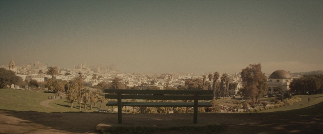Frame from The Diary of a Teenage Girl — bench, building