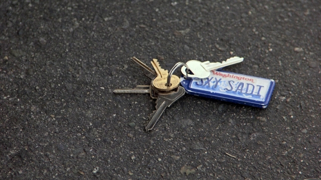 Wide shot frame from The Accused — street, key