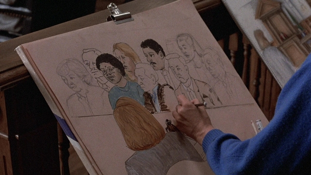 Wide shot frame from The Accused — sitting, standing, room