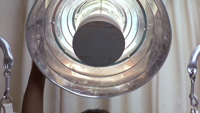 Frame from The Accused — room, tableware
