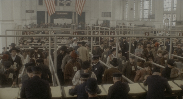 Wide shot frame from The Godfather: Part II — room, train, person