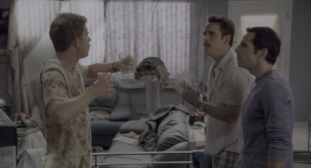 Wide shot frame from There's Something About Mary — standing, room, dialogue