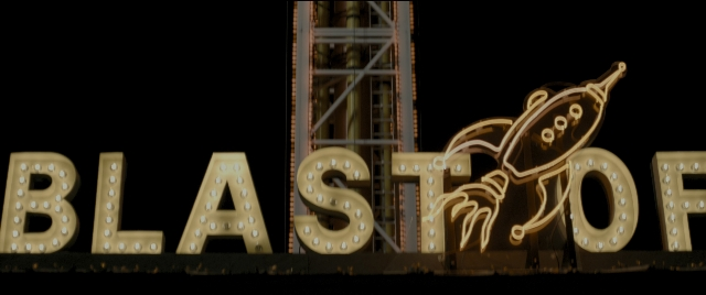 Wide shot frame from Zombieland — night, boat, building