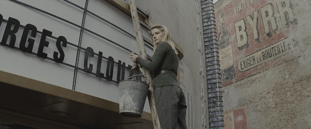 Wide shot frame from Inglourious Basterds — standing, face, hair