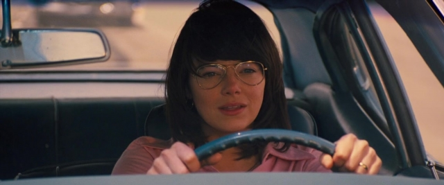 Medium shot frame from Battle of the Sexes — street, mirror, car