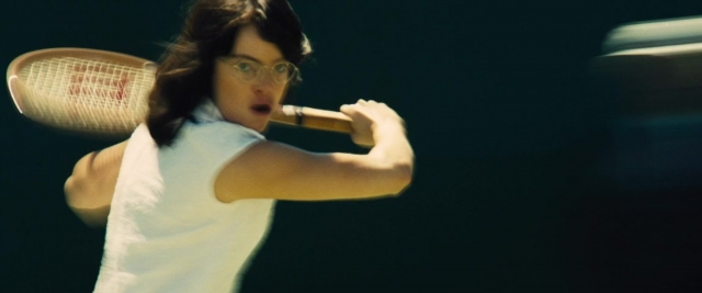 Frame from Battle of the Sexes — hand, hair, person