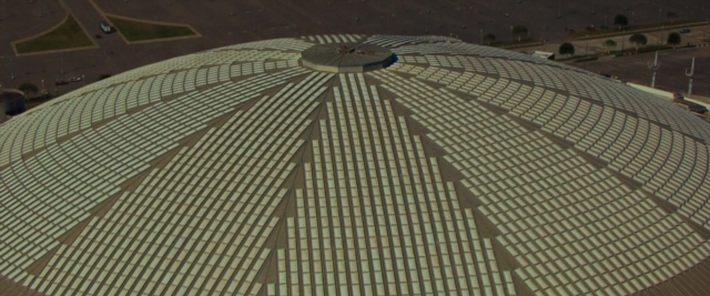 Frame from Battle of the Sexes — building