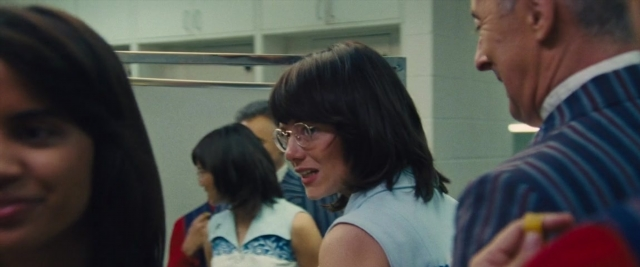 Frame from Battle of the Sexes — room, dialogue, hand