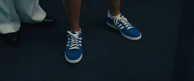Wide shot frame from Battle of the Sexes — standing, person, footwear