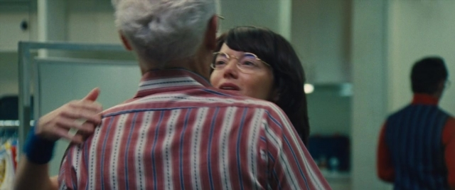 Frame from Battle of the Sexes — room, shirt, face
