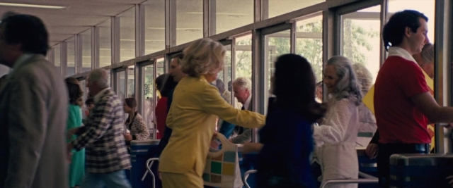Frame from Battle of the Sexes — standing, dialogue, shirt