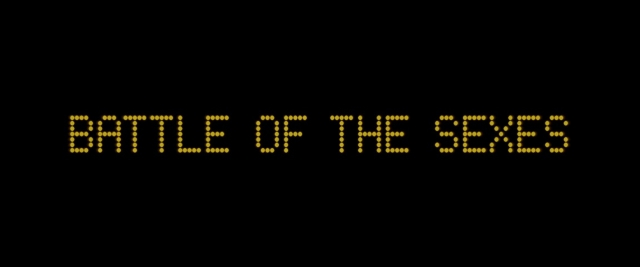 Wide shot frame from Battle of the Sexes — digital clock