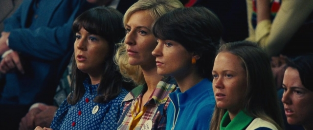 Medium shot frame from Battle of the Sexes — sitting, face, hair