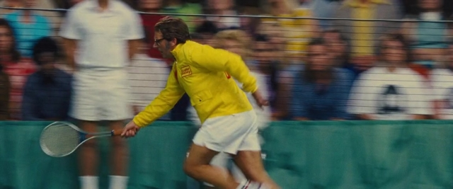 Wide shot frame from Battle of the Sexes — hand, shirt, sock
