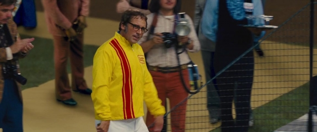 Wide shot frame from Battle of the Sexes — walking, hand, face