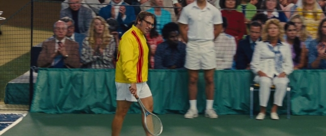 Wide shot frame from Battle of the Sexes — standing, face, person