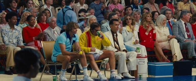 Wide shot frame from Battle of the Sexes — sitting, room, dialogue