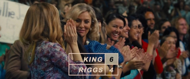 Wide shot frame from Battle of the Sexes — dress, person, human face