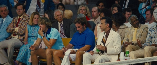 Wide shot frame from Battle of the Sexes — sitting, room, dialogue