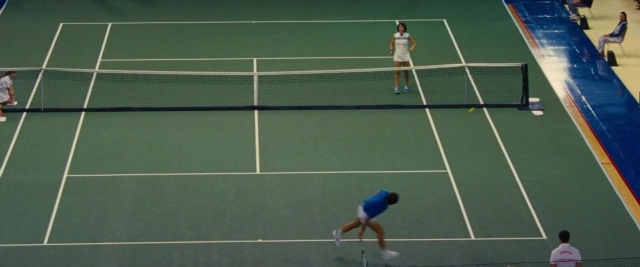 Wide shot frame from Battle of the Sexes — person, tennis ball