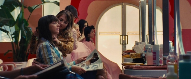 Frame from Battle of the Sexes — sitting, room, table