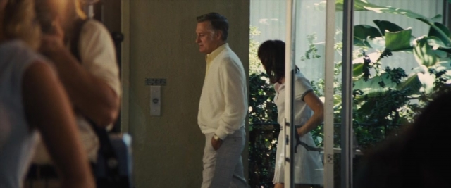 Frame from Battle of the Sexes — standing, dress, shirt