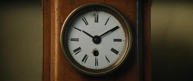 Medium shot frame from 101 Dalmatians — room, hand, face