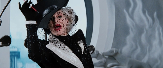 Wide shot frame from 101 Dalmatians — hat, coat, hand