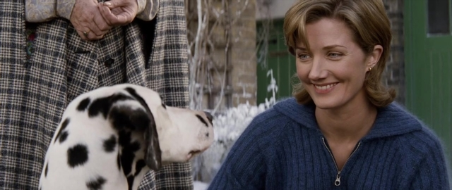 Medium shot frame from 101 Dalmatians — standing, door, dog
