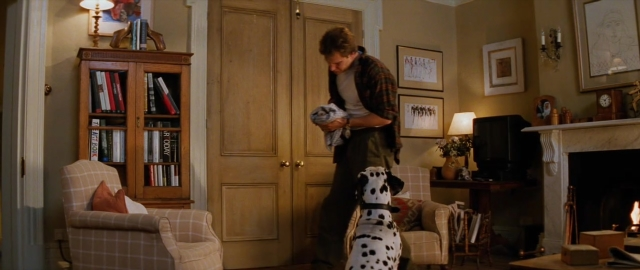 Wide shot frame from 101 Dalmatians — book, standing, dog