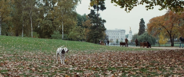 Wide shot frame from 101 Dalmatians — sitting, walking, dog