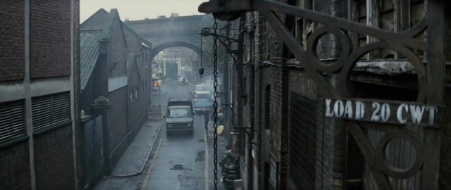 Medium shot frame from 101 Dalmatians — walking, street, person