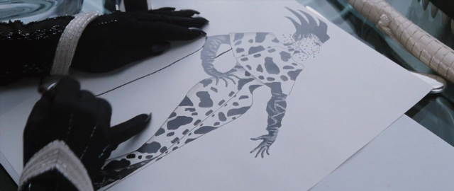 Medium shot frame from 101 Dalmatians — table, animal, glass