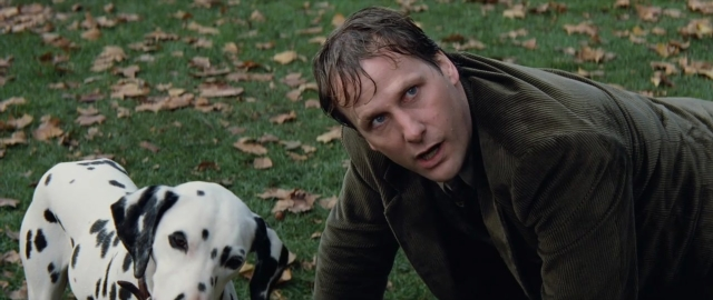 Wide shot frame from 101 Dalmatians — standing, dog, face