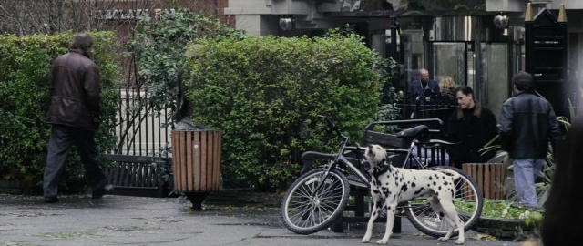 Frame from 101 Dalmatians — standing, walking, street