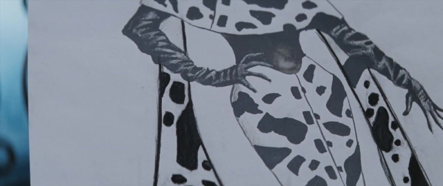 Wide shot frame from 101 Dalmatians — dress, person