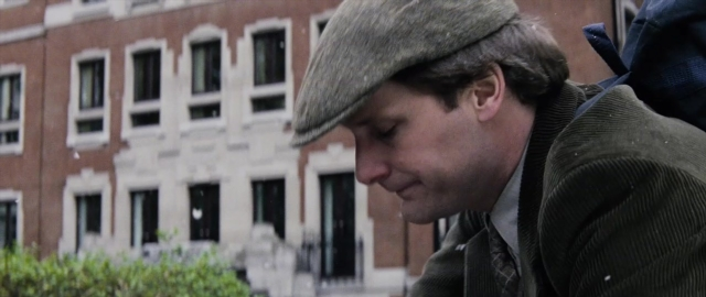 Frame from 101 Dalmatians — book, hat, person