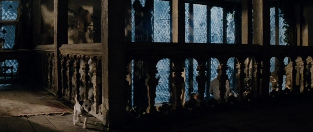 Wide shot frame from 101 Dalmatians — room, glass, window