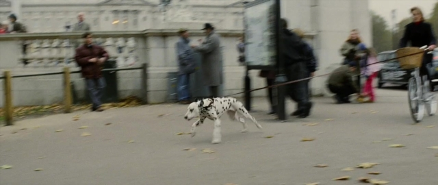 Frame from 101 Dalmatians — walking, street, dog