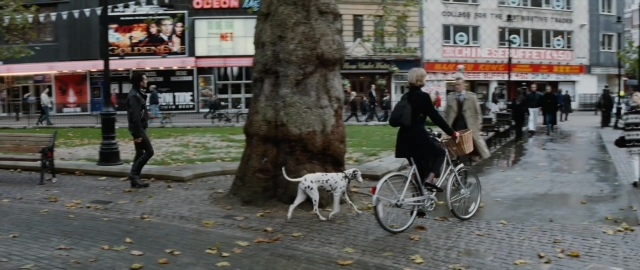 Frame from 101 Dalmatians — walking, street, dog