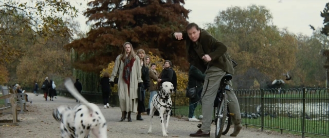 Wide shot frame from 101 Dalmatians — sitting, walking, dog