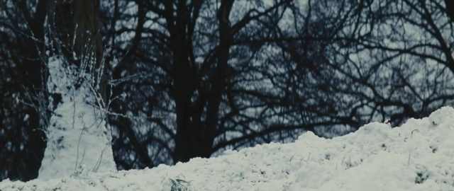 Frame from 101 Dalmatians — snow, snowman