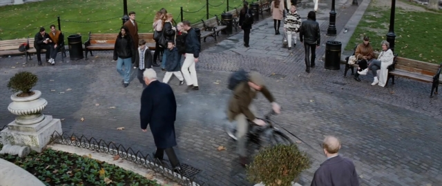Wide shot frame from 101 Dalmatians — sitting, standing, walking