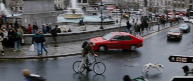 Frame from 101 Dalmatians — walking, street, hat