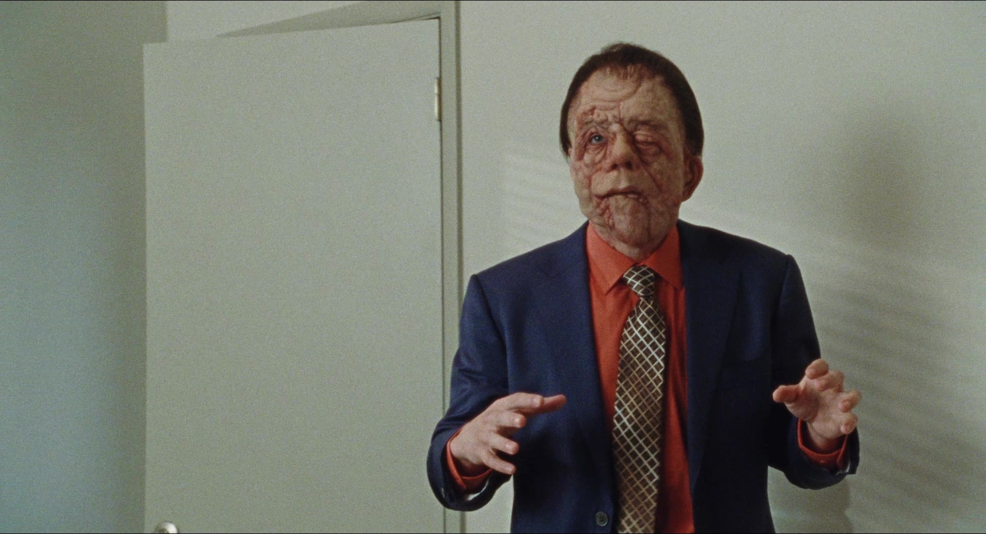 A Different Man (2024), wide, 1.85:1 — film still